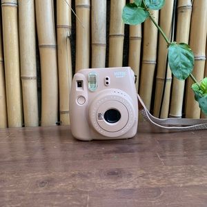 Cocoa Polaroid camera with matching strap